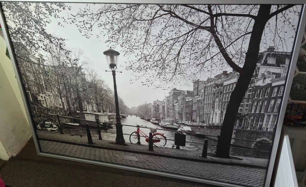 Schilderij gracht in Amsterdam, Ophalen