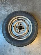 12 inch opel velg met oude band, Ophalen, Gebruikt