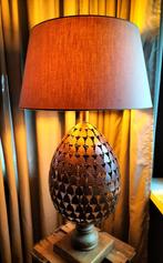Antieke lamp met metalen voet, Ophalen