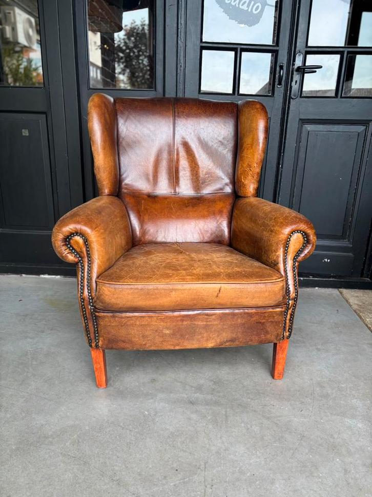 Schapenleren Vintage Oorfauteuil merk DNG, Huis en Inrichting, Fauteuils, Gebruikt, Leer, 75 tot 100 cm, 75 tot 100 cm, Ophalen of Verzenden