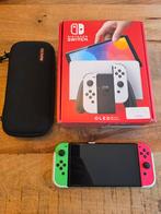 Nintendo Switch OLED met accessoires, Spelcomputers en Games, Spelcomputers | Nintendo Switch, Ophalen, Zo goed als nieuw, Met 2 controllers