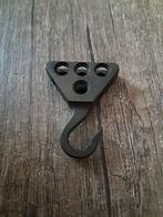 Lego ijzeren haak, Ophalen