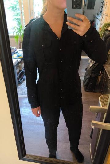 Zwarte doorzichtige blouse beschikbaar voor biedingen