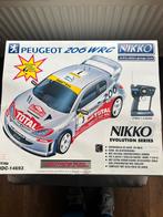 Nikko Peugeot 206WRC, Ophalen of Verzenden, Zo goed als nieuw, Elektro, Auto onroad