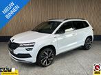 Skoda Karoq 1.5 TSI Sportline Business NL auto | Trekhaak |, Auto's, 4 cilinders, 150 pk, Wit, Bedrijf