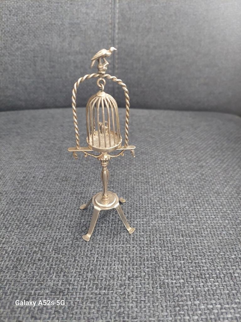 verzilverd miniatuur vogelkooitje, Ophalen