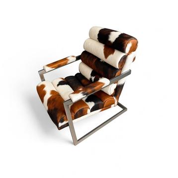 fauteuil in koeienhuid beschikbaar voor biedingen