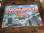 Monopoly Almere Editie - Bordspel Nieuw in folie, Hobby en Vrije tijd, Gezelschapsspellen | Bordspellen, Een of twee spelers, Ophalen