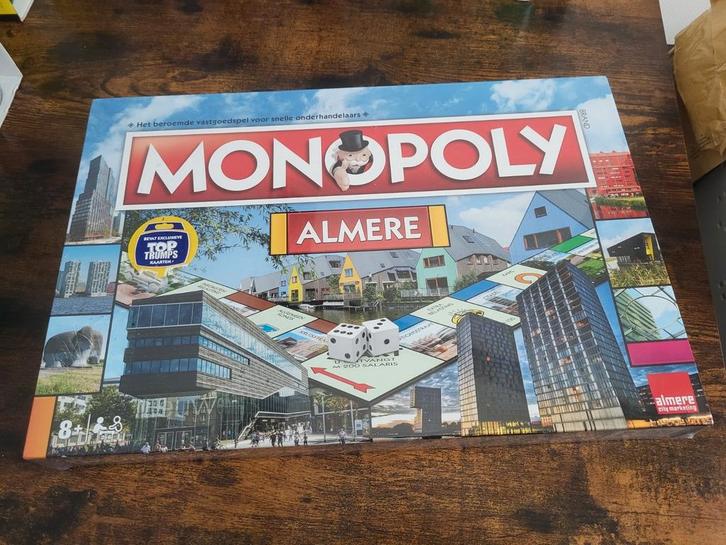 Monopoly Almere Editie - Bordspel Nieuw in folie, Hobby en Vrije tijd, Gezelschapsspellen | Bordspellen, Nieuw, Een of twee spelers