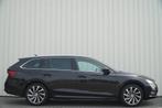 Skoda Octavia Combi 1.4 TSI 204pk iV PHEV Business Edition P, Auto's, 12 maanden, Stof, Gebruikt, Zwart