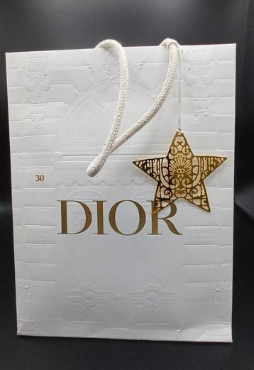 Dior decoratieve koperen ster met tas beschikbaar voor biedingen