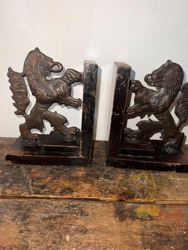 2 antieke hollandse leeuwen boekensteunen messing /metaal, Antiek en Kunst, Curiosa en Brocante, Ophalen of Verzenden