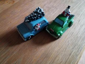 2 verschillende kerst auto,s met verlichting(2 aaa baterijen beschikbaar voor biedingen