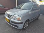 Hyundai Atos 1.1i Active primera. 84000 km NAP, Auto's, Voorwielaandrijving, Stof, Gebruikt, Zwart