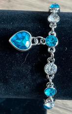 Armbandje, zilverkleur en blauwe steen. Nieuw!!, Ophalen of Verzenden, Zo goed als nieuw, Blauw, Overige materialen