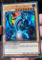 Yu-Gi-Oh! Blue-Eyes White Dragon LCKC-EN001 1st Ed M/NM !, Ophalen of Verzenden, Zo goed als nieuw, Losse kaart, Foil