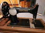 Antieke Gritzner hand-naaimachine, Ophalen