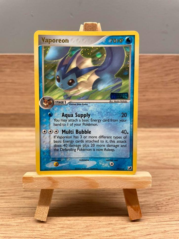 Vaporeon 19/115, EX Unseen Forces, Hobby en Vrije tijd, Verzamelkaartspellen | Pokémon, Zo goed als nieuw, Losse kaart, Foil, Ophalen of Verzenden