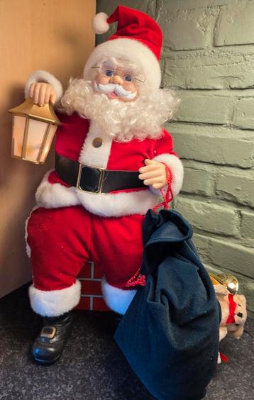 Vintage kerstman wat beweegt en geeft licht  beschikbaar voor biedingen