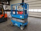 Genie GS 1932 Elektrische Schaarhoogwerker 7.8 meter werkhoo, Zakelijke goederen, Machines en Bouw | Liften, Steigers en Ladders