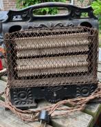 Gietijzeren straalkacheltje Revo, Ophalen