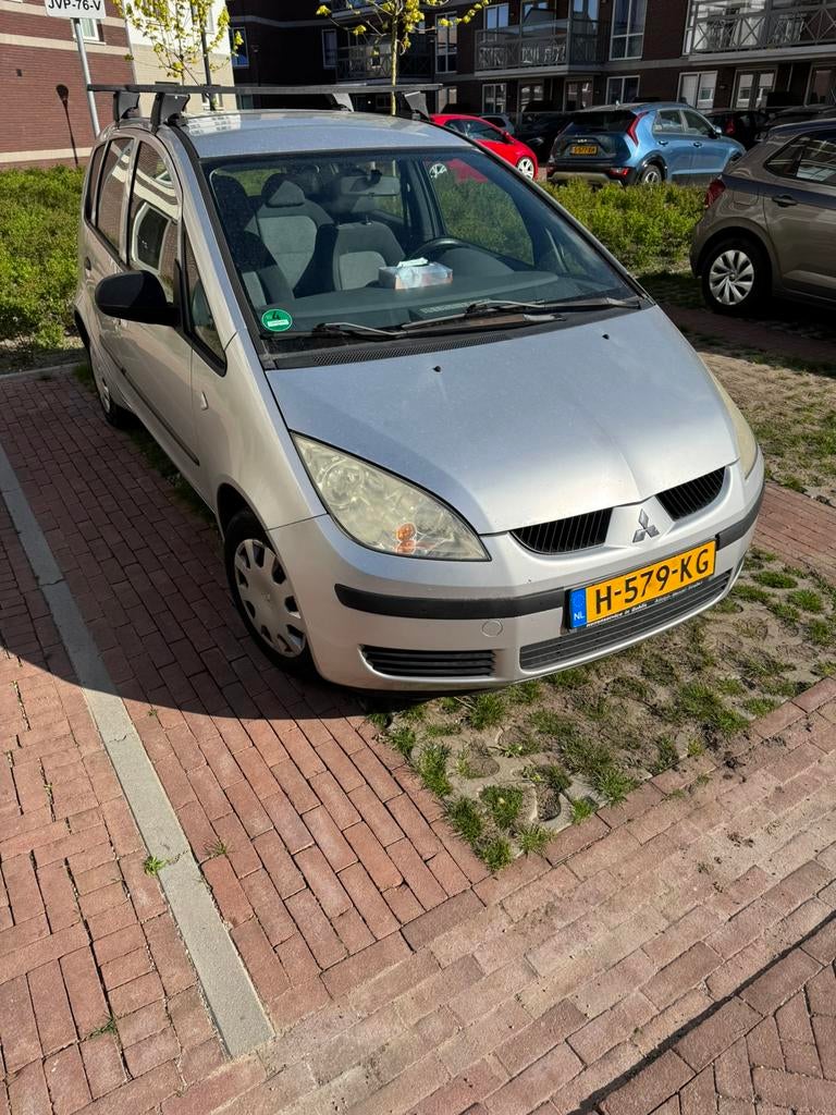 Mitsubishi Colt 1.1benzine 2005 Grijs154.000km, Auto's, Voorwielaandrijving, Stof, 74 pk, 31 €/maand