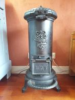 Antieke gietijzeren kachel - Patria, Huis en Inrichting, Kachels, Ophalen, Gebruikt, Houtkachel, Vrijstaand