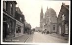 Geldrop (N.B.), Kerkstraat met winkels en volk, gelopen 1940, Verzamelen, Ansichtkaarten | Nederland, Verzenden, 1920 tot 1940