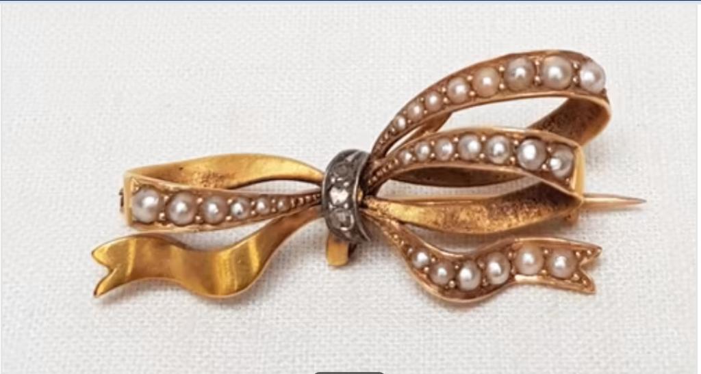 Juweel strik broche Goud 18 kt., Sieraden, Tassen en Uiterlijk, Antieke sieraden, Ophalen of Verzenden, Goud, Broche, Met edelsteen