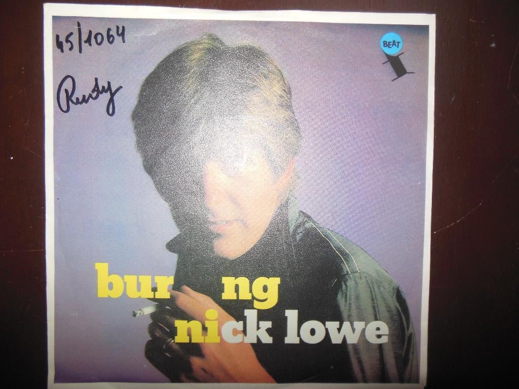 single nick lowe 45rpm jukebox vinyl record burning 7inch, Gebruikt, 7 inch, Single, Ophalen of Verzenden
