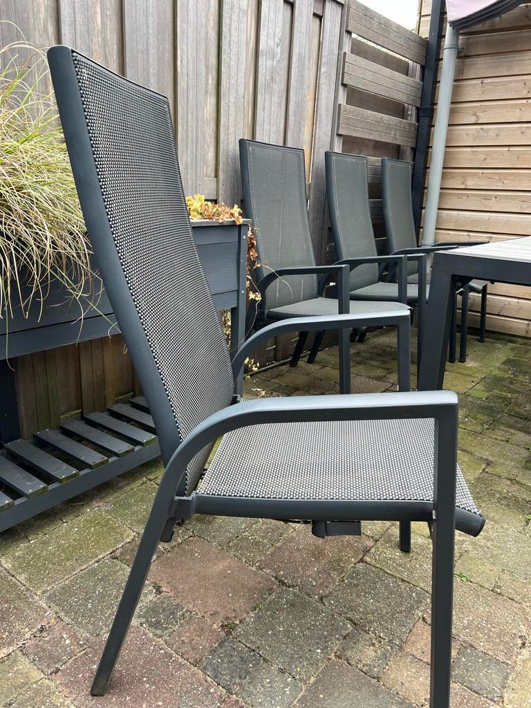 Tuinset met 7 stoelen, 7 kussens en houtlook steen tafelblad, Overige materialen, Gebruikt, Eettafel, Ophalen of Verzenden