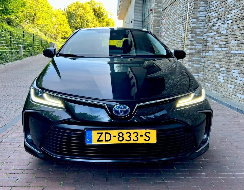 Toyota Corolla 1.8 Hybrid Dynamic 2019 Zwart 10J Gar. | NAP, 4 cilinders, Corolla, Zwart, Sedan
