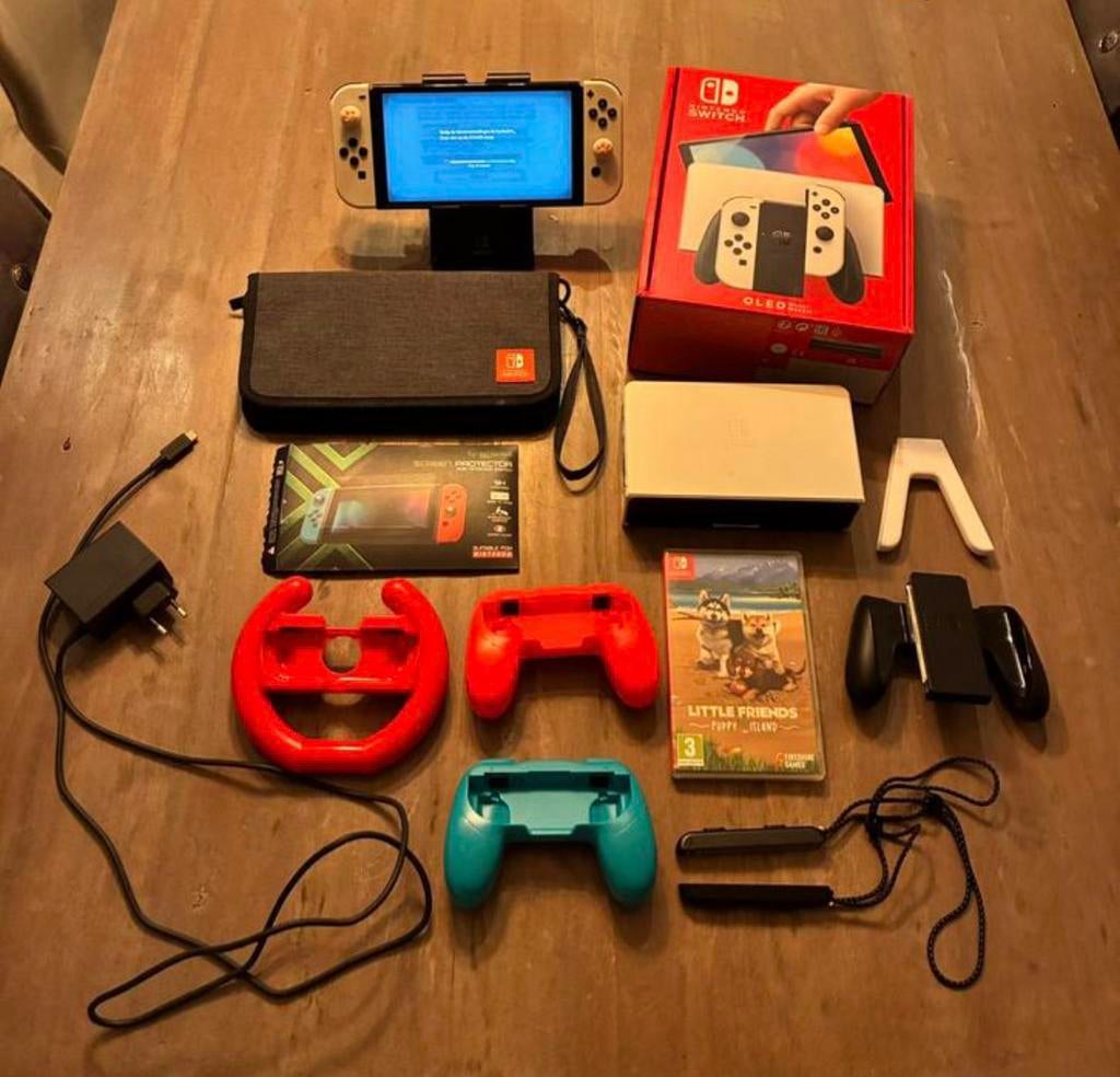 Nintendo switch oled wit met accesoires, Spelcomputers en Games, Spelcomputers | Nintendo Switch, Switch OLED, Met games, Met 2 controllers