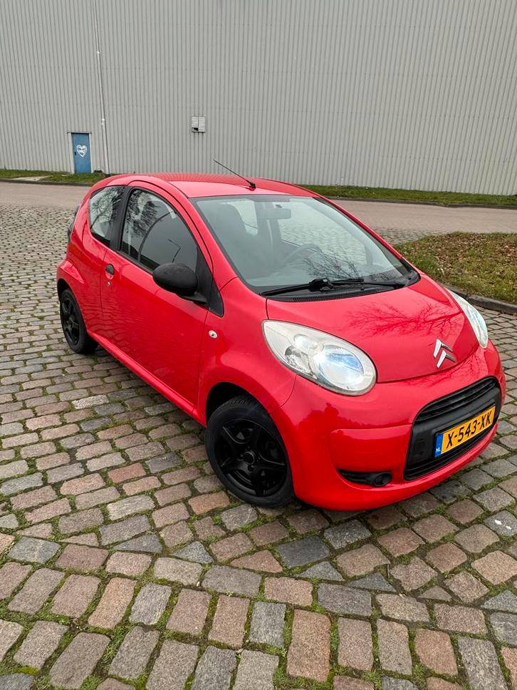 Citroën C1 2010 Rood met nieuwe koppeling, Auto's, Citroën, Particulier, ABS, Airbags, Bluetooth, Metallic lak, Radio, USB, Benzine