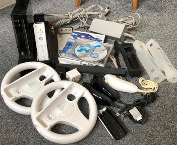 Grote wii set met oplaadstation en meer beschikbaar voor biedingen