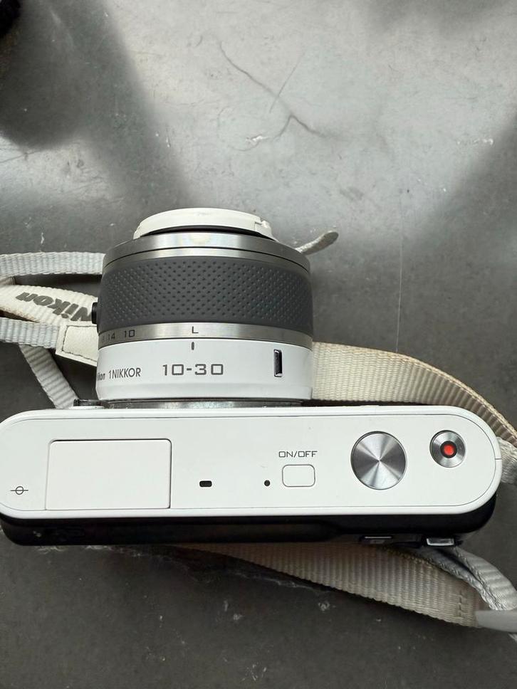 Nikon 1 J1 + 2 lenzen (10-30 & 30-110) + accessoires, Audio, Tv en Foto, Fotocamera's Digitaal, Gebruikt, Compact, Nikon, 4 t/m 7 keer