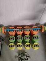 Reebok bodypump set, Sport en Fitness, Fitnessmaterialen, Ophalen, Zo goed als nieuw, Benen, Halterschijven