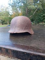 Duitse m40 helm aangeboden met battledamage, Verzamelen, Ophalen of Verzenden, Duitsland, Helm of Baret