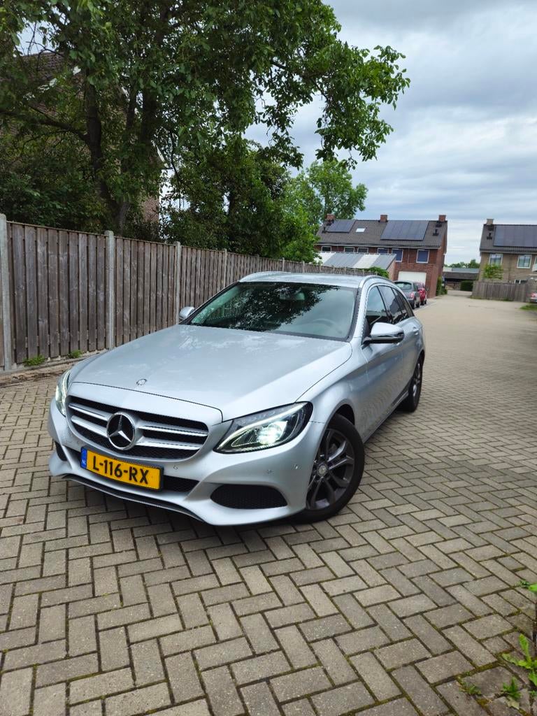 Mercedes-Benz C-Klasse C180 1.6 115KW Aut7 Estate 2017 Grijs, Automaat, Achterwielaandrijving, 1800 kg, Leder en Stof