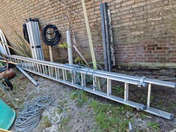 Schuifladder 2x 5 meter (ca 8 meter bij volledig uitschuiven beschikbaar voor biedingen