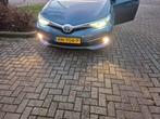 Toyota Auris 1.8 Hybrid Touring Sports CVT 2015 Blauw, Auto's, Toyota, 28 km/l, 345 kg, Blauw, Origineel Nederlands