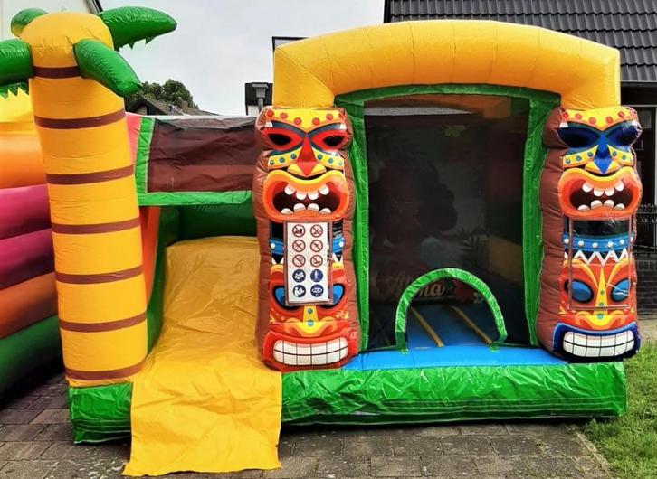 Hawaii springkussen met glijbaan en eventueel zwembad, Hobby en Vrije tijd, Feestartikelen | Verhuur, Zo goed als nieuw, Overige