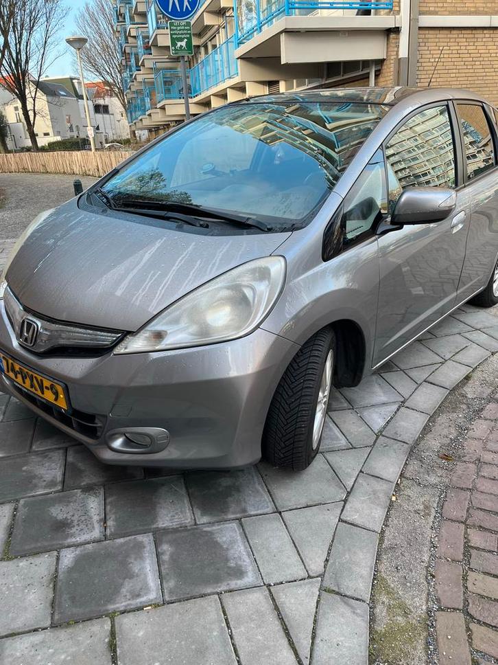 Honda Jazz 1.4 I-vtec 102pk CVT 2011 hybride kleur Grijs, Auto's, Honda, Particulier, Jazz, 360° camera, ABS, Achteruitrijcamera