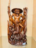 Vintage Indonesisch houtsnijwerk beeldje vissersman, Ophalen