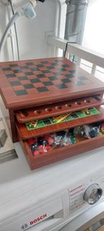 houten spellenkist, Ophalen