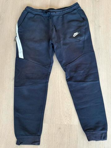 Nike Tech trainingspak blauw (maat L) beschikbaar voor biedingen