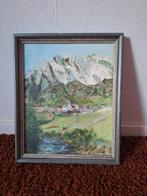 Ingelijst schilderij van een bergdorpje, Ophalen