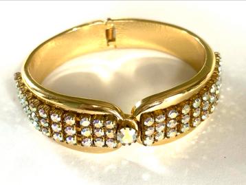 Vintage klem armband met aurora boralis beschikbaar voor biedingen