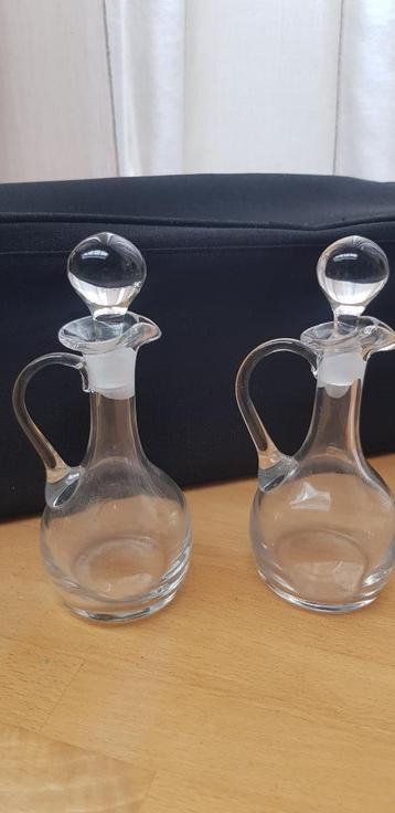 Glazen olie/azijn stel beschikbaar voor biedingen