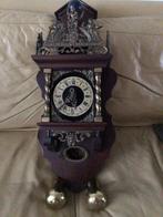 Zaanse stoeltjesklok, Ophalen